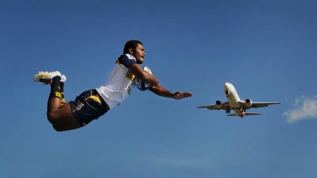 Brumbies winger Henry Speight takes flight at Canberra Airport on Thursday (and yes, this photo is real).