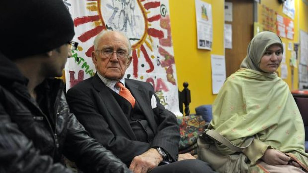 Former Australian prime minister Malcolm Fraser with Arshad Isbal and his wife, Wajihi Arshad, at the Asylum Seeker Resource Centre in West Melbourne.