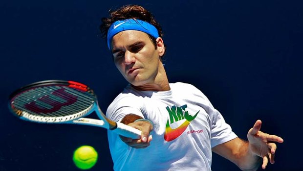 Finding the groove &#8230; Roger Federer steps up his Australian Open preparation with a hit at Melbourne Park on Sunday.