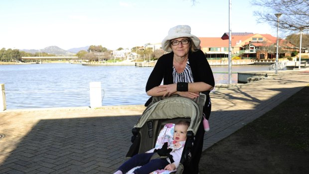 Emmy Yager of Isabella Plains with her daughter Phoebe at Lake Tuggeranong.