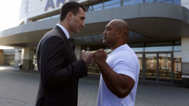 Vladimir Klitschko and Alex Leapai pose after their press conference.