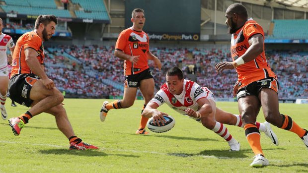 Strong start: Gerard Beale scores a try for the Dragons against the Tigers on Sunday.