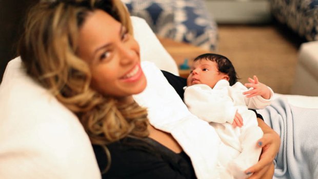 Expensive taste ... Beyonce holds her daughter Blue Ivy.