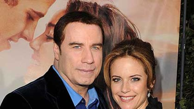 John Travolta and Kelly Preston ... expecting.
