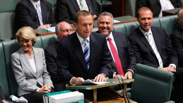On the attack ... Tony Abbott delivers his budget reply.
