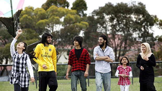 The Hasmat family, refugees from war-torn Afghanistan, are making their mark in Australia. From left: Maryam, Poya, Solaiman, Shaheen, Madina and mother Shaiqu.