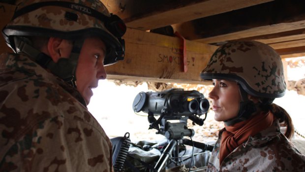 Princess Mary speaks to a soldier during her visit to the Danish troops in Helmand, Afghanistan.
