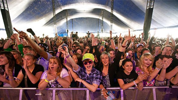 Splendour in the Grass attendees get into the positive vibe of the festival at the old venue in Byron Bay in 2009.