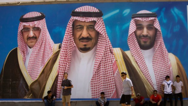 No room "for anything traditional": A billboard showing King Salman, centre, his son Mohammed bin Salman, right, and former heir Mohammed bin Nayef in Taif, Saudi Arabia.