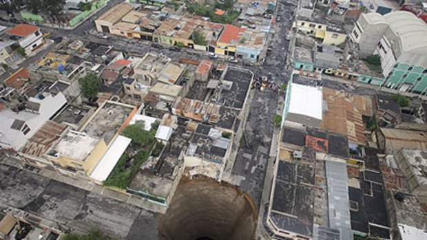 A giant sinkhole caused by the rains of  the storm in Guatemala City.