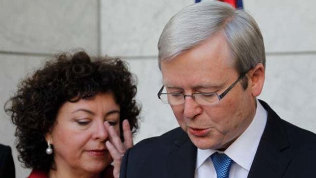 Poised to disappear ... Kevin Rudd, with tearful wife Therese Rein.