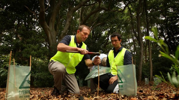 Opposition Leader Tony Abbott (left) shows how to be a practical greenie.
