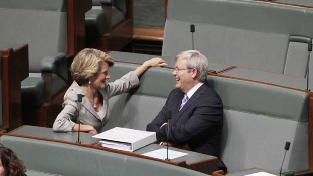 Kevin Rudd talks with Julie Bishop during question time at Parliament House.