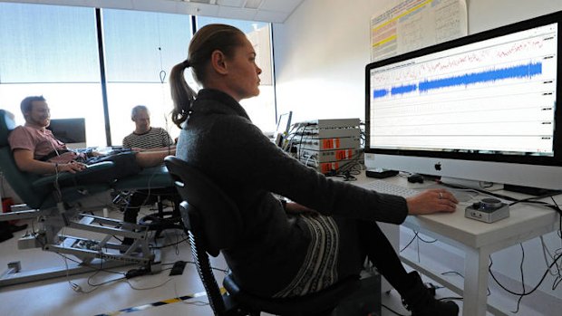 Research fellow Rachael Brown, right, tracks nerve impulses from actor Ben Schultz, left, during during an experiment at the University of Western Sydney.