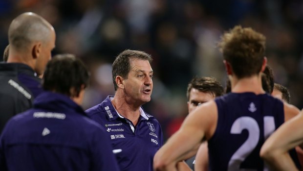 Coach Ross Lyon gets his playing group on message.