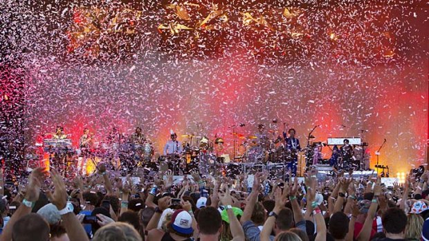 Out with a bang: Confetti covers the crowd as Arcade Fire help to close out this year's Big Day Out festival in Sydney.