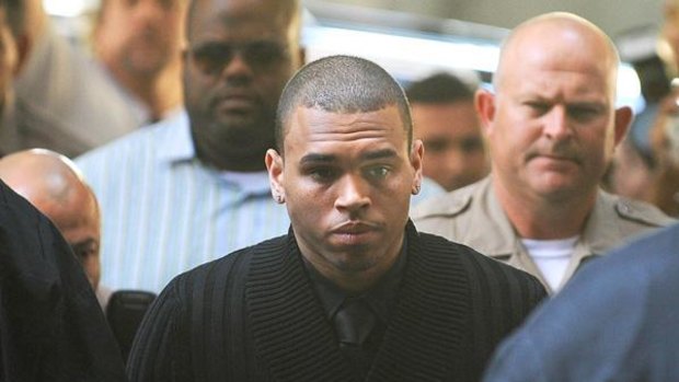 Chris Brown arrives at Los Angeles Superior Court for his arraignment on April 6, 2009.