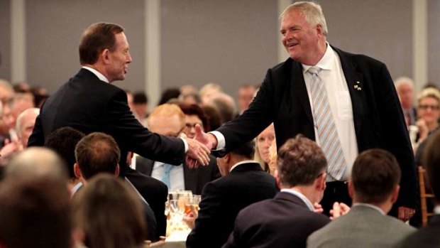 Prime Minister Tony Abbott greeted Ambassador Kim Beazley before a speech to the American Australian Association in New York. Mr Beazley, a former Labor leader, has had his term as ambassador extended.