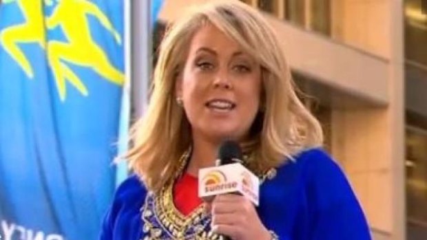<i>Sunrise</i> host Samantha Armytage announcing the trip from on top of a camel in Martin Place.