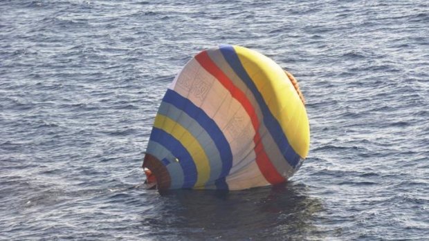 Crash landing: The hot-air balloon Chinese cook Xu Shuaijun crashed in waters near the East China Sea islands before being rescued by the Japanese. 