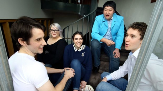 Syd Zygier, centre, with members of the Achoired Taste choir, from left, Andrew Ryan, Catherine Thompson, Dennis Wang and Jake Colman.