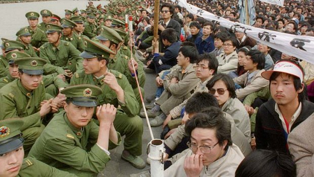 Turning point: Pro-democracy protesters confront police.