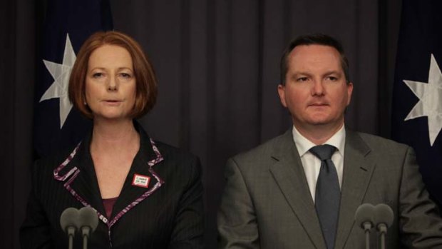 Prime Minister Julia Gillard and Immigration Minister Chris Bowen comment on asylum seeker policy at Parliament House on Thursday.