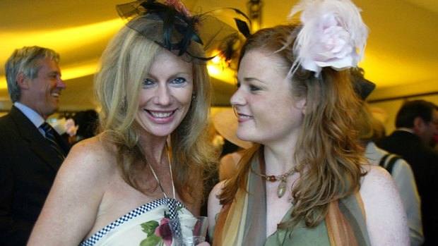 Shari-Lea Hitchcock, left, and Lauren Hawker in the Emirates Marquee at the Melbourne Cup Carnival 2004.
