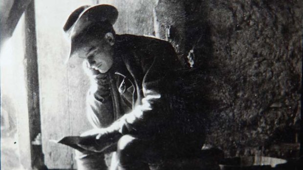 First-hand ... Private George Griffin in a barn in France with his diary.