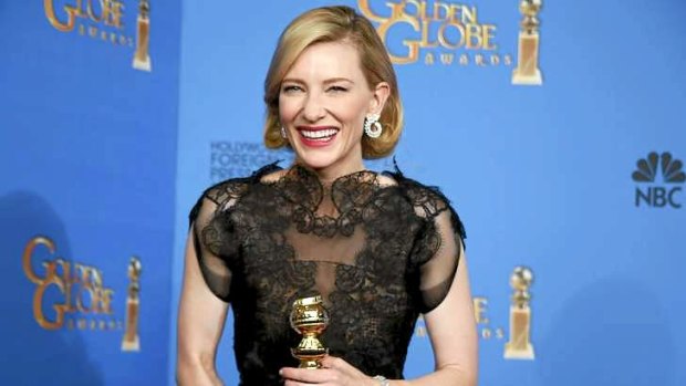 Actress Cate Blanchett poses backstage with her Best Performance by an Actress in a Motion Picture - Drama Award for "Blue Jasmine" at the 71st annual Golden Globe Awards in Beverly Hills, California.
