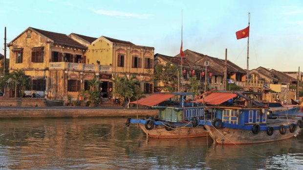 Historic buildings hug the river at Hoi An in central Vietnam, where the influence of traders from China, Japan, Britain, Holland and France is visible at every turn.