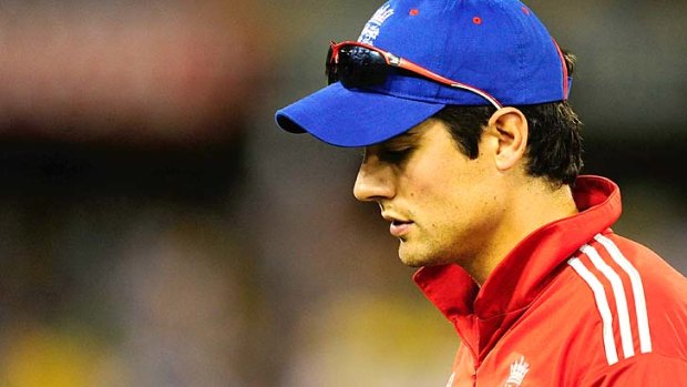 Feeling the strain: Alastair Cook after England lost in Brisbane.