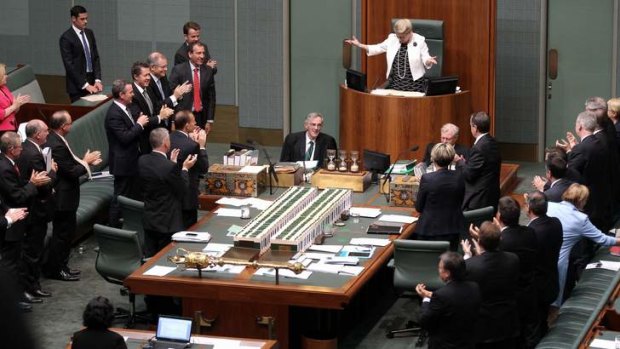 Retiring Clerk of the House of Representatives Bernard Wright receives a standing ovation at Parliament House.