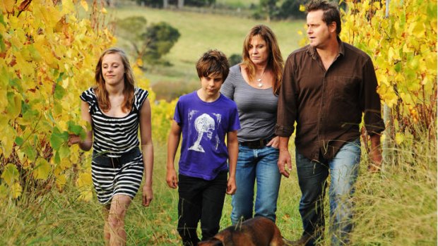 Activist runs on the board ... Peter Whish-Wilson with his family, Bronte, 13, Finn, 11, and Natalie at their property on the Tamar River.