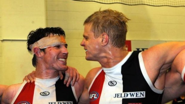 Lenny Hayes and Nick Riewoldt celebrate a victory over Geelong during the 2010 finals series.