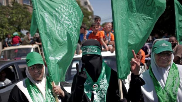 Palestinian Hamas supporters gather for a rally in Gaza City, Gaza Strip, on Thursday.