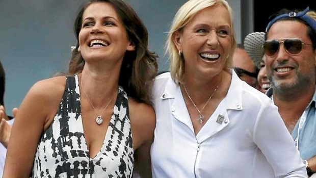 Tennis great Martina Navratilova (right) and her partner Julia Lemigova celebrate after getting engaged at the US Open.