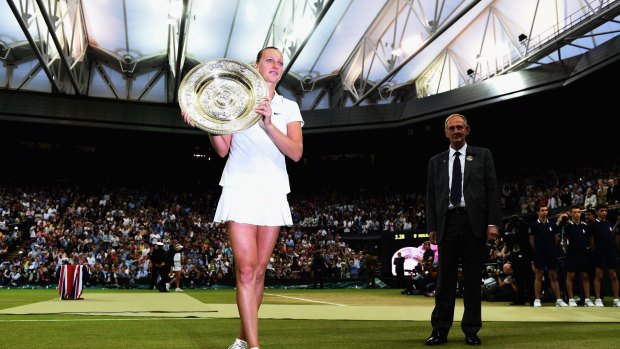 Pressure: Petra Kvitova celebrates her second Wimbledon triumph this year.