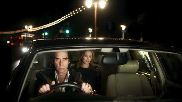 VIP passenger: Nick Cave drives Kylie Minogue in a scene from the documentary 20,000 Days On Earth, set to open the Sydney Film Festival.