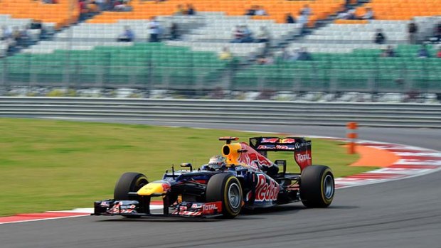 Red Bull-Renault driver Sebastian Vettel of Germany drives during the third practice session at the Buddh International circuit in Greater Noida, on the outskirts of New Delhi.