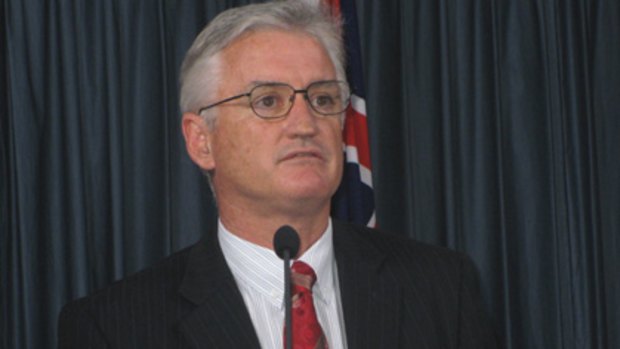 Former Premier Alan Carpenter announcing his resignation as leader of Labor.