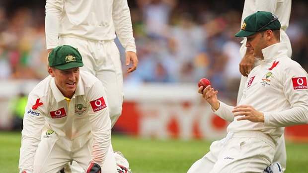 Is this what I dropped? Michael Clarke and Brad Haddin have a hard look at the cherry after Clarke put down an edge from Dean Brownlie.