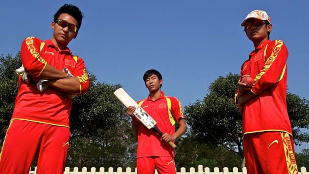 Spirit of Confucius ... cricket ambassadors Jason Zhao, 19, Zhang Peng, 26, and William Wang, 18, at Bankstown Oval.