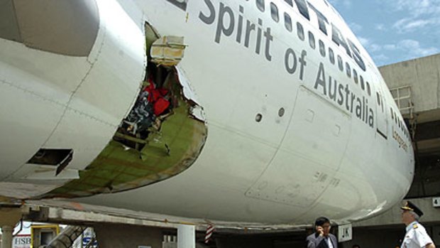 The hole in the side of the Qantas airliner.