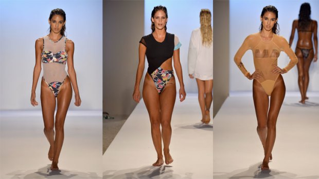 Models walk the runway at the Minimale Animale show during Mercedes-Benz Fashion Week Swim 2014 in Miami Beach, Florida.