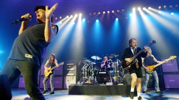 AC/DC, from left, Brian Johnson, Malcolm Young, Phil Rudd, Angus Young, and Cliff Williams performing in Munich, southern Germany.