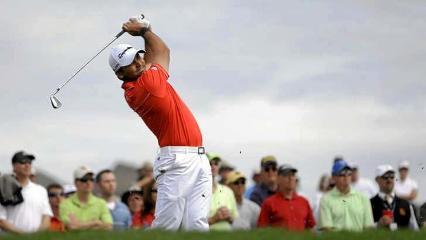 Day out: Jason Day, of  Australia, watches his tee shot on the third hole in his championship match against Victor Dubuisson, of France, during the Match Play Championship.