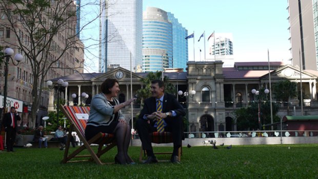 Brisbane Councillor Vicki Howard and Lord Mayor Graham Quirk test out the deck chairs.