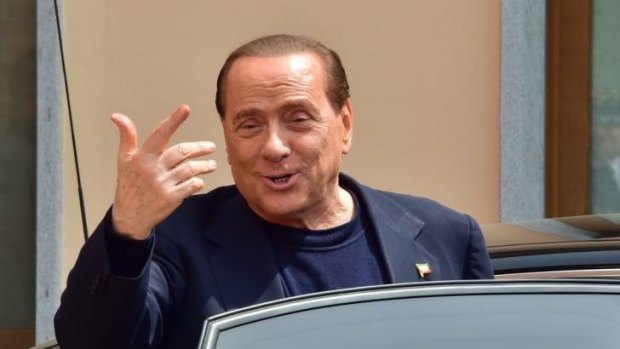 Clocking off: Silvio Berlusconi leaves the Catholic hospice Sacra Famiglia in Cesano Boscone after his first day of community service for tax fraud.