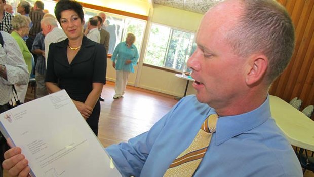 Signed, sealed and delivered ... Campbell Newman reads his resignation letter.